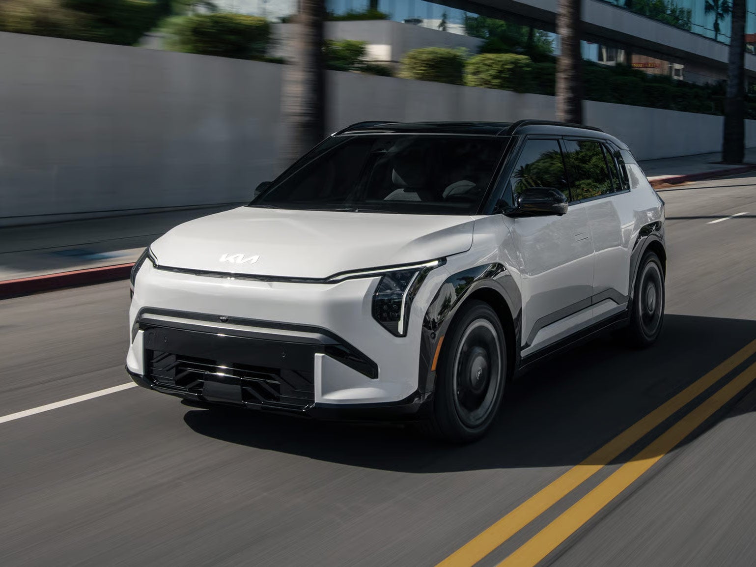 2027 Kia EV3 driving on the highway