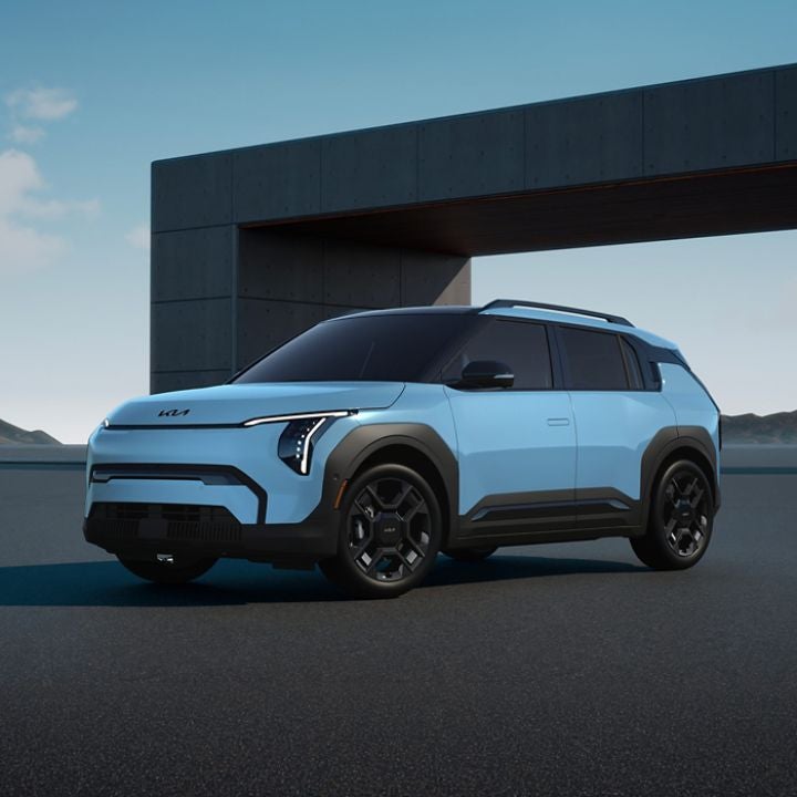 Blue 2027 Kia EV3 electric crossover featuring modern exterior styling at Classic Kia Waukegan