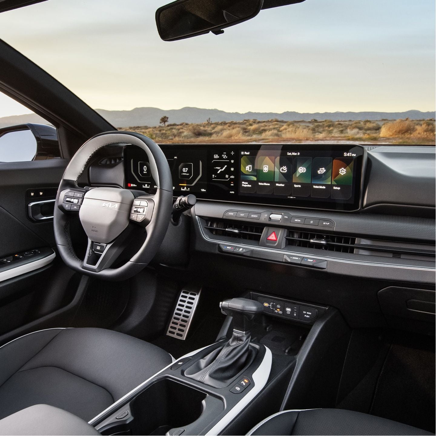  2025 Kia K4's driver's cockpit featuring a 12.3-inch widescreen display full-view